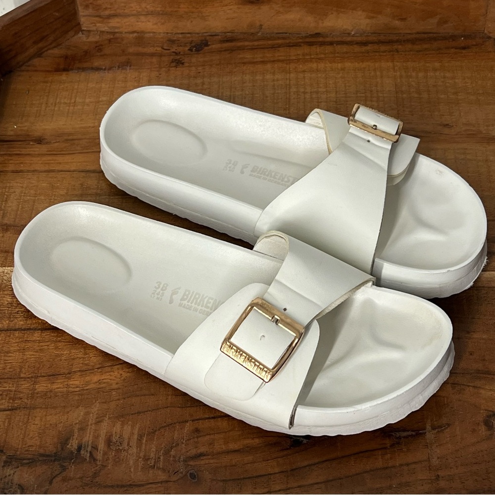 Birkenstock White Slide Sandals with Gold Buckles